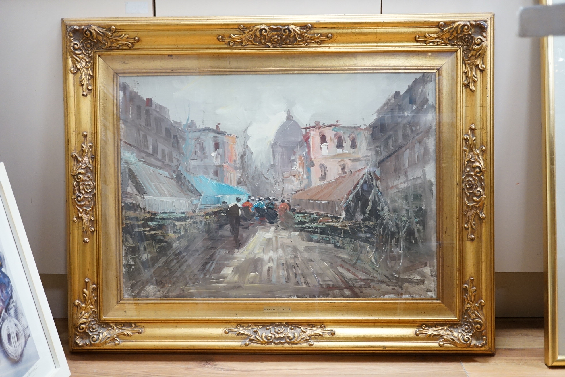Lino Vito, oil on canvas, Continental street scene, 48 x 68cm, applied plaque to the frame. Condition - good